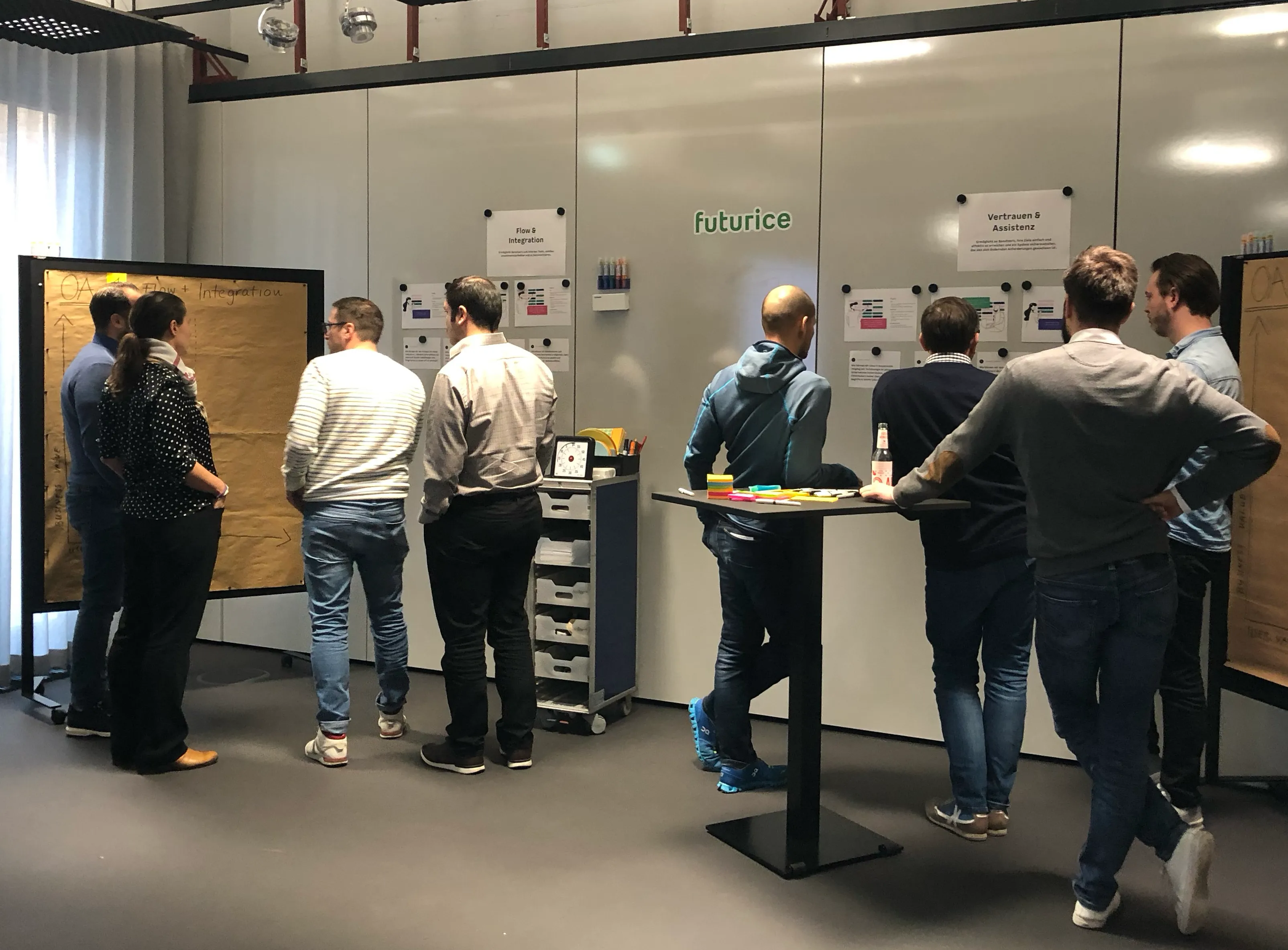 Workshop session with participants collaborating around a table